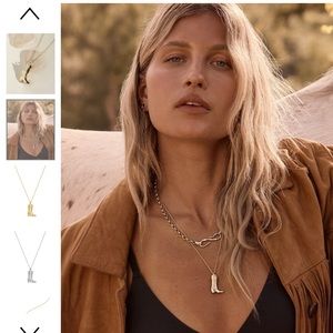 Gold James Michelle Boot necklace. Chain is too long for personal preference